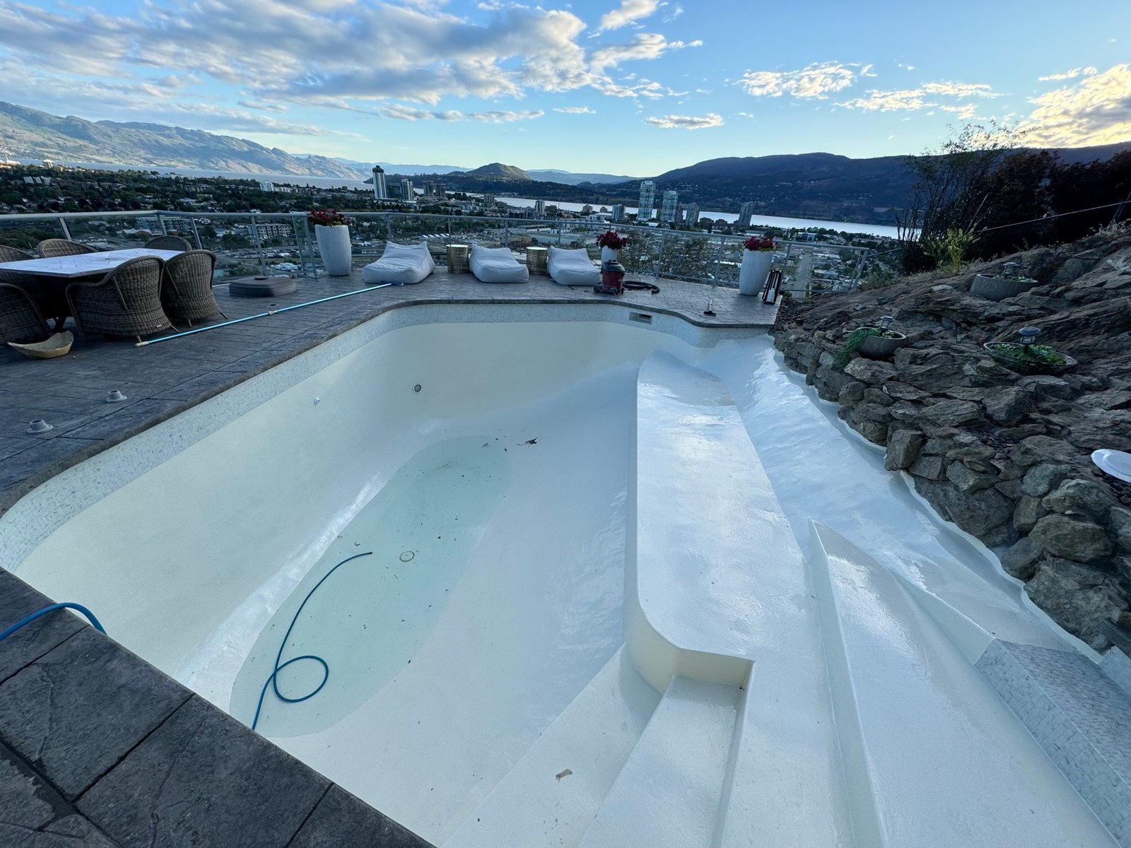 Detail of a tanning ledge and spillover spa